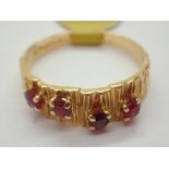 18ct gold vintage 1970 four stone ruby ring with bark finish size O