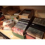 Shelf of mixed CDs