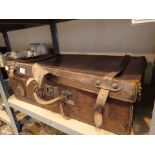 Large antique heavy leather suitcase