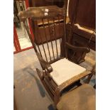 Stick back pine rocking chair with mahogany coloured finish