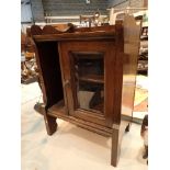 Smokers cabinet with single glazed bevel glass door and two interior shelves