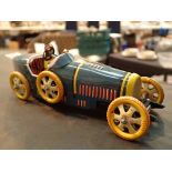 Vintage style tin plate clockwork car