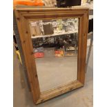 Large heavy wall mounted pine cased mirror with bevel edges 92 x 68 cm