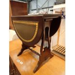 Lyre table with leatherette covered top