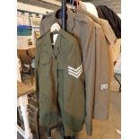 Three Army dress uniforms and one jacket