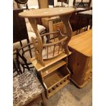 Two contemporary pine side tables with lower magazine rack storage