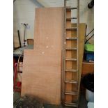 Set of wooden two piece ladders with 2 meter sheet of marine plyboard and another plyboard sheet