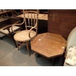 Mahogany octagonal coffee table and a bentwood office chair