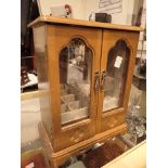 Wooden jewellery box with glass doors