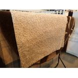 Four woollen rugs of various sizes