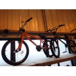 Two BMX style single gear bikes