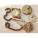 Collection of vintage wristwatch movements including a rolled gold example