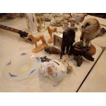 Leonardo owl with further ceramic and carved animal figurines including dolphins