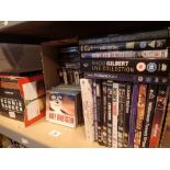 Shelf of CDs and DVDs including box sets of Dinner Ladies Bonnie Barker etc and Philips DVP3120 DVD