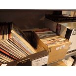 Two boxes of long play records and singles 60s and Country to include Elvis 50 Gold volume 1