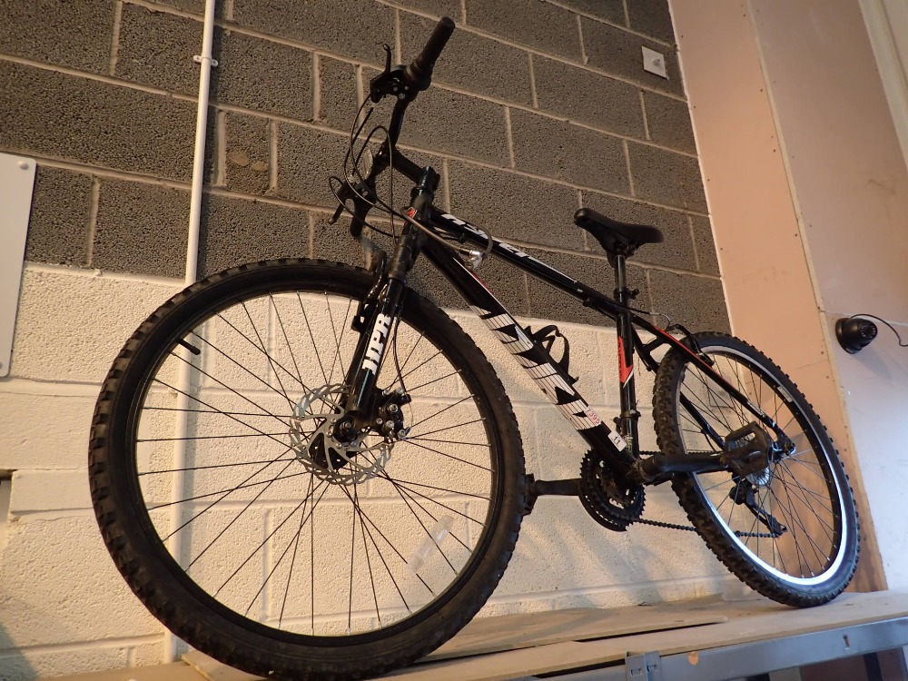 Red and Black mountain bike with front suspension and disc brake 21 speed