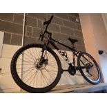 Red and Black mountain bike with front suspension and disc brake 21 speed