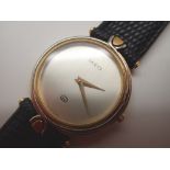 Gucci gold plated gents wristwatch on a leather strap in original box