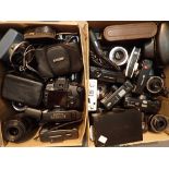 Two boxes of cameras and lenses etc