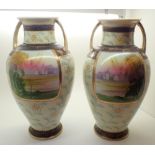 Pair of twin handled Noritake vases with village and wood scenes H: 30 cm