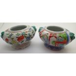 Pair of Oriental hand painted bowls with floral and figural design L: 10 cm