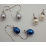 Three pairs of genuine pearl and silver earrings