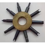 Unusual Swiss Star watch spider tool with ten different fitments