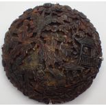 Oriental tortoiseshell carved circular brooch CONDITION REPORT: Significant loss to