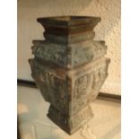 Large bronze Oriental stand decorated with mythical beasts and masks H: 28 cm