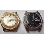 Two Timex wristwatch heads one automatic other quartz movement requiring battery