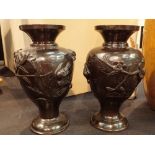 Pair of Oriental lacquered bronze vases H: 25 cm