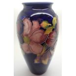 Moorcroft large blue ground clematis vase H: 25 cm