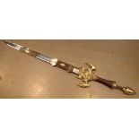 Reenactment steel and brass fantasy sword with dragon guard and wrapped leather handle blade length