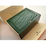 Rolex Daytona green leather wristwatch box with outer card case and unopened papers and a Rolex