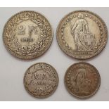 Two swiss franc coins 1910 and 1916 and two half Francs