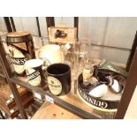 Collection of Guinness related items including glasses and advertising items and other alcohol