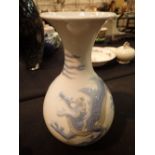 Large blue and white Lladro vase with dragon decoration H: 30 cm