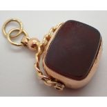 9ct gold spinning fob set with bloodstone and carnelian