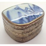 Small white metal Oriental box with blue and white ceramic lid