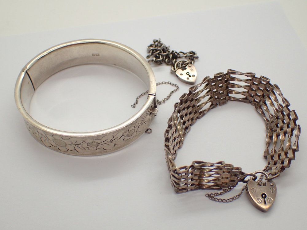 Hallmarked silver bangle and two hallmarked silver bracelets CONDITION REPORT: No