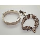 Hallmarked silver bangle and two hallmarked silver bracelets CONDITION REPORT: No