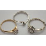 Three 9ct gold solitaire rings gross 6.