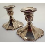 Pair of hallmarked silver Art Deco stub candlesticks assay Birmingham weighted A/F