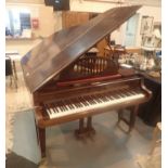 IBach baby grand piano in mahogany