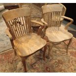 Pair of elm seated elbow chairs