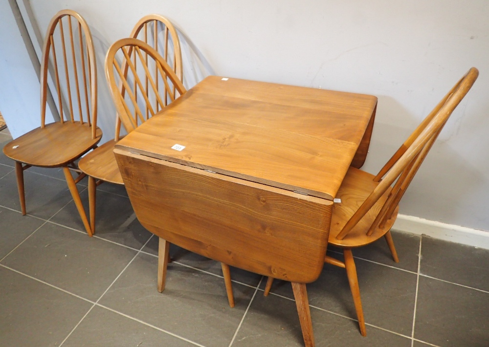 Ercol elm dropleaf table and four stickback elm chairs 74 x 137 cm CONDITION REPORT: