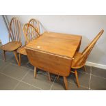 Ercol elm dropleaf table and four stickback elm chairs 74 x 137 cm CONDITION REPORT: