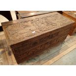 Heavy country style Green Man and Gryphon design carved oak chest 104 x 46 cm