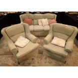 Green upholstered three piece suite