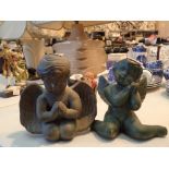 Pair of antique style angelic earthenwar